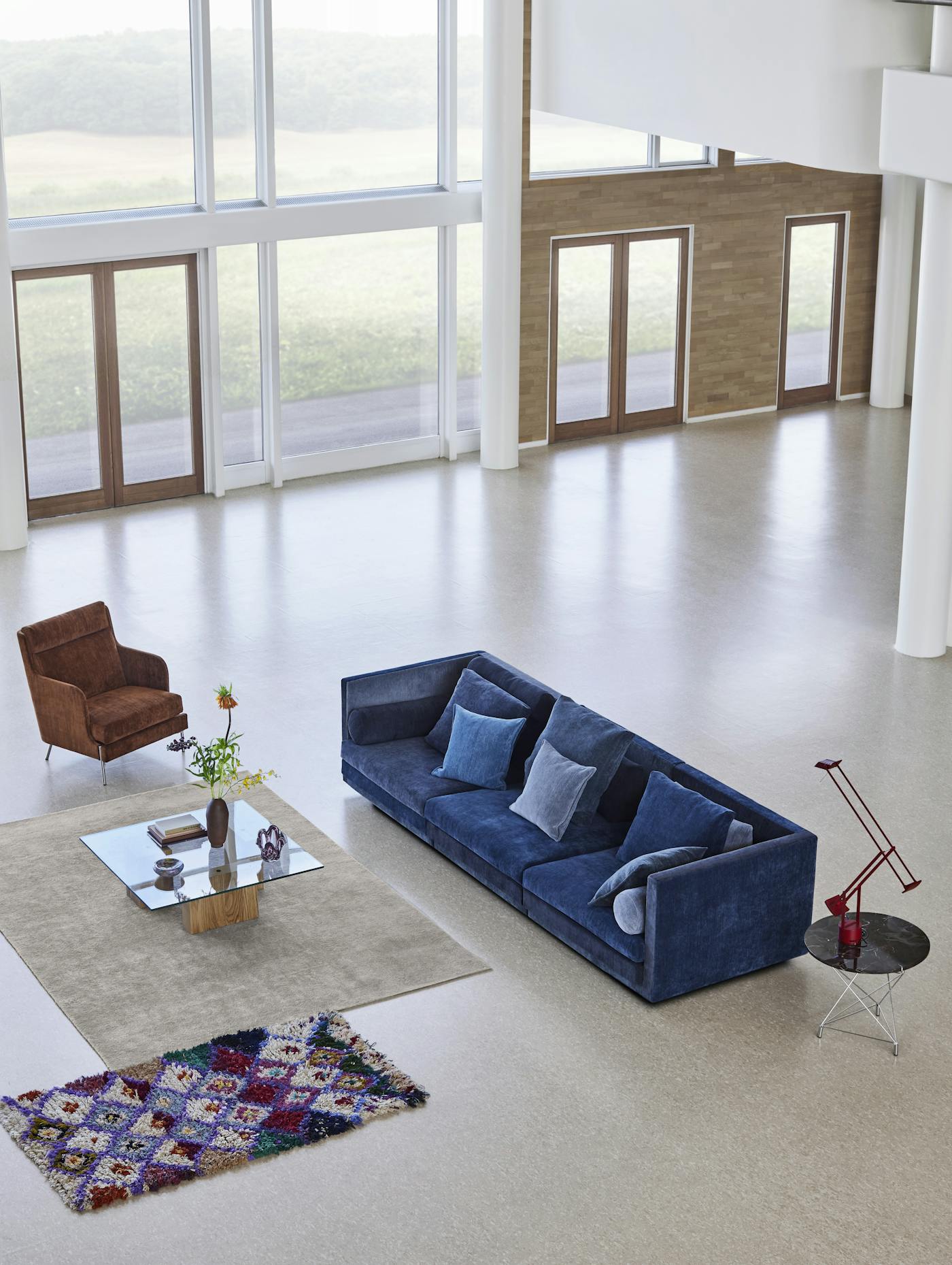 Cocoon sofa 320x106 cm Multi colour Blues with Puzz table and Spider triangle table and Funen high back chair and Wheel footstool 0142
